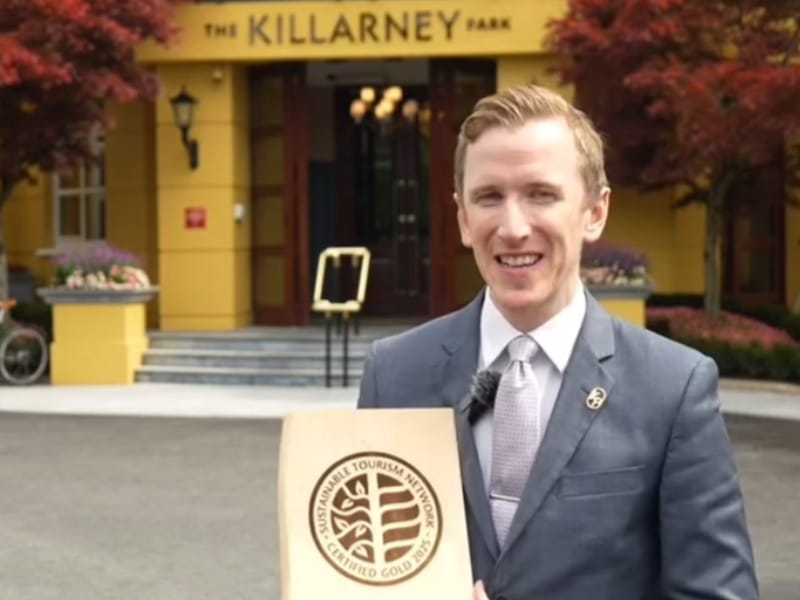 Marcus Treacy, owner of the Killarney Park Hotel, proudly displays his Gold Certification plaque from the Sustainable Tourism Network. 