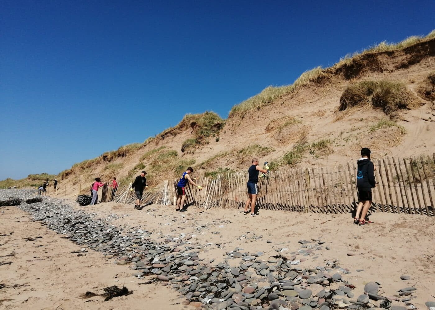 Community members restoring sand dunes in Maharees to combat climate impact